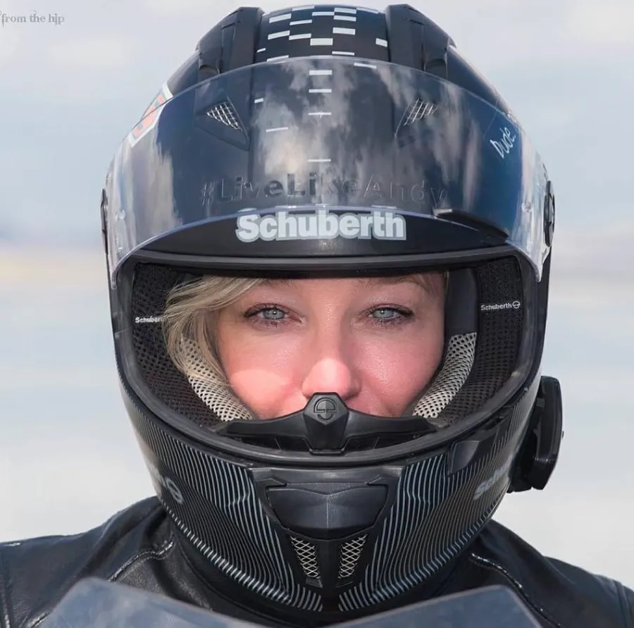 Erin Sills, world-record motorcycle racer on the fastest BMW, gears up in a Schuberth helmet